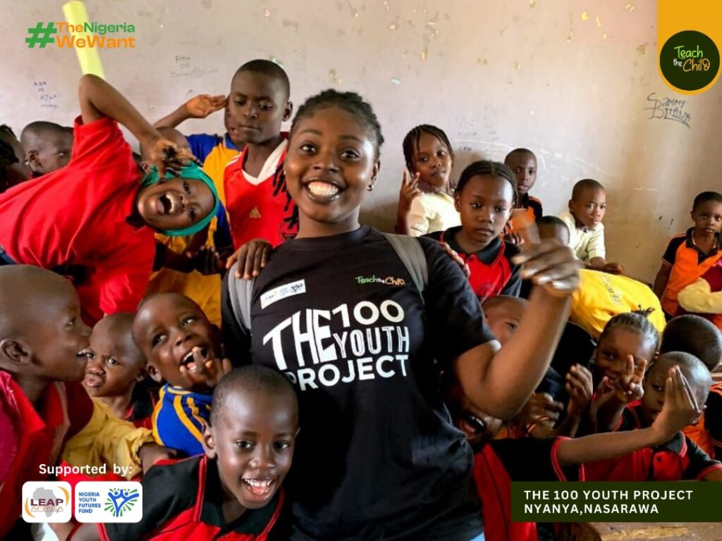 Children with volunteers in a classroom in Nyanya, Nasarawa State