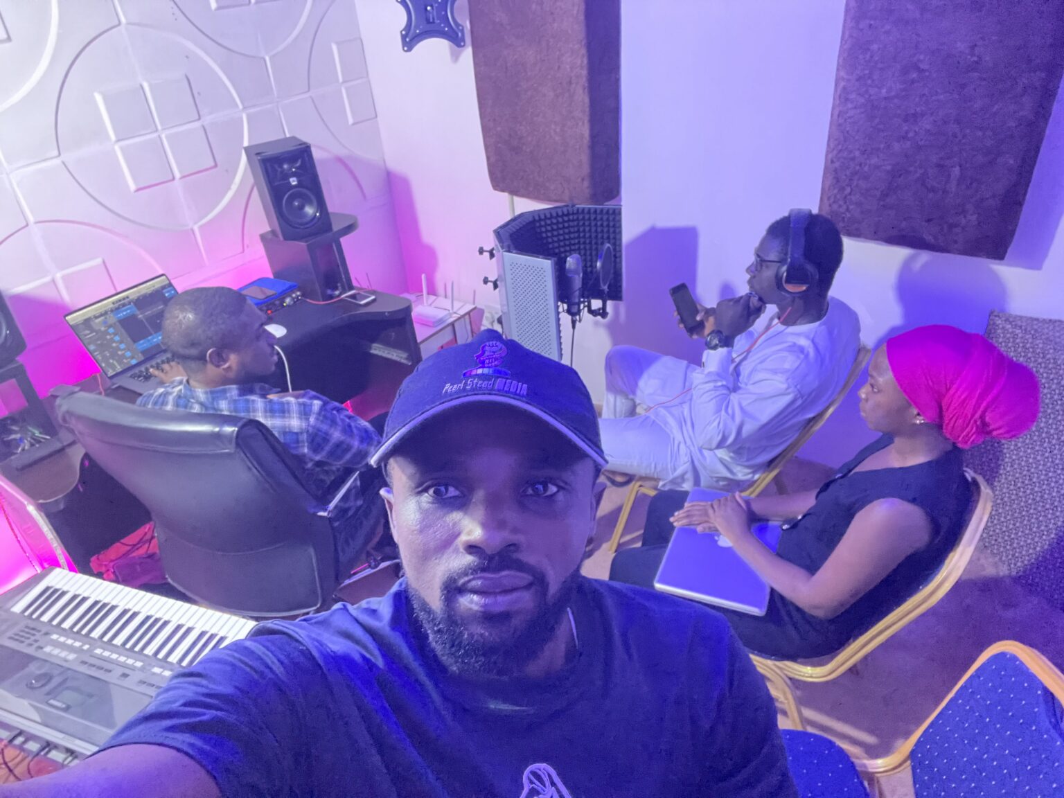 Guests in the radio studio during an episode of From Chalkboard to Creativity radio show